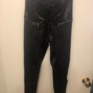 Lace up black leggings from Dolls Kill